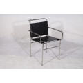 Eillen gray dining chair in black leather